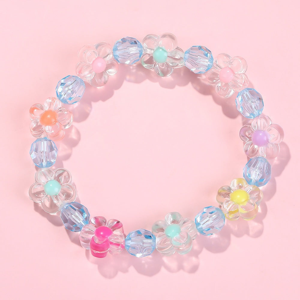 Friendship bracelet with colorful flower motifs Kalsten
