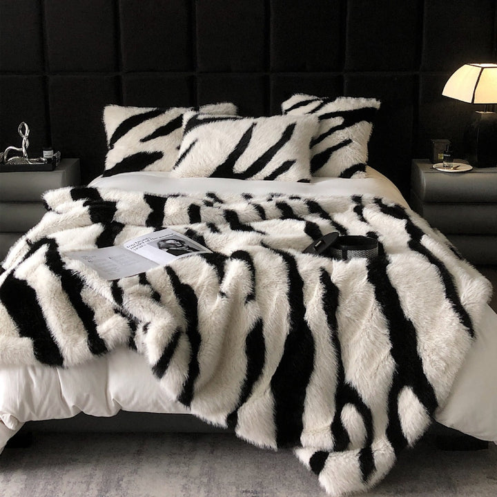 Faux fur bedspread with zebra design and extra fluffy texture