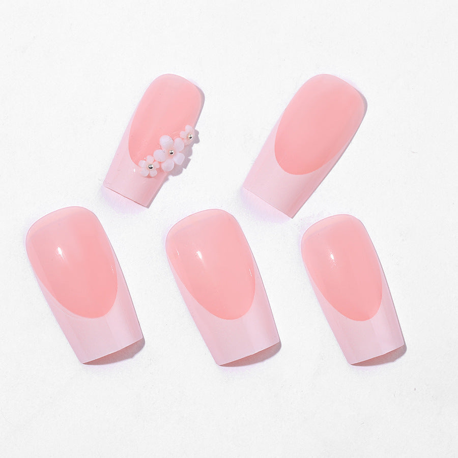 Artificial nail set with elegant French tips and hand-drawn flower motifs Kalsten