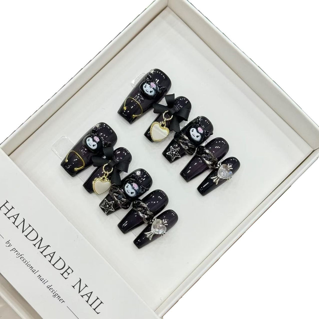 Artistic Themed Press-On Nail Set with Unique Charms and Designs