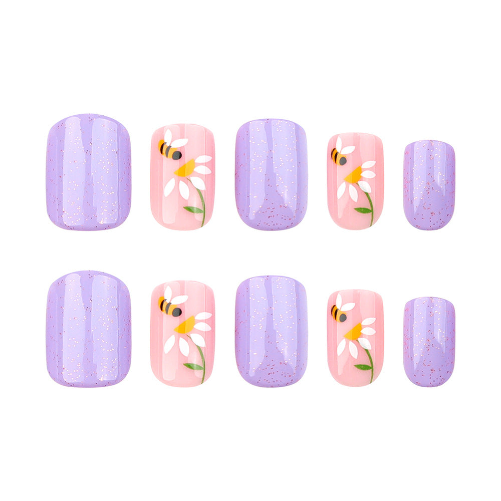 Artfully designed nail extensions with flower design Kalsten