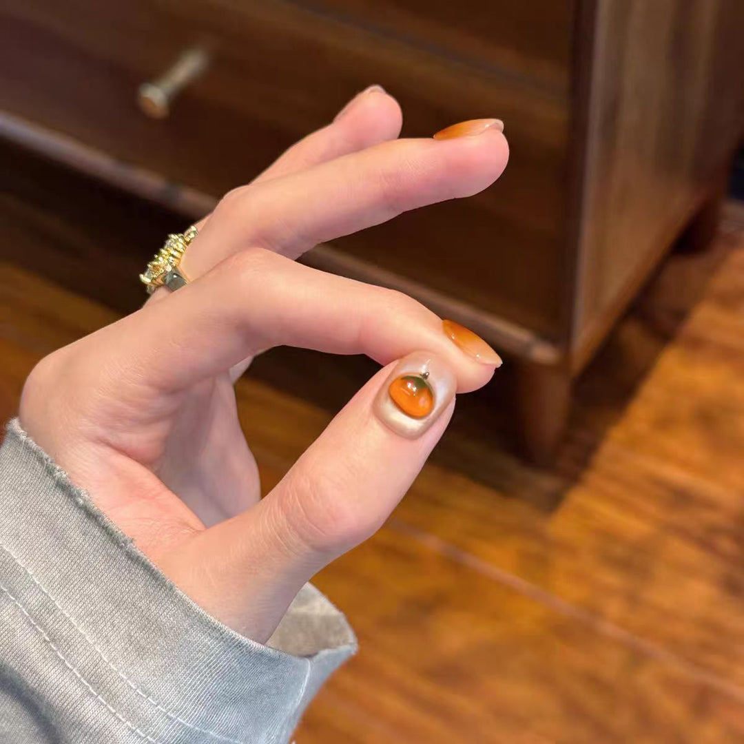Artificial nails with elegant ombre effect and floral accents Kalsten