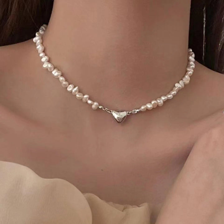 Elegant silver pearl bracelet with heart details Kalsten