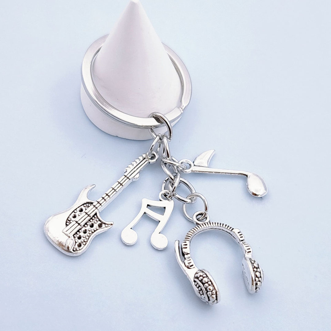 Keychain with musical instruments motifs Kalsten