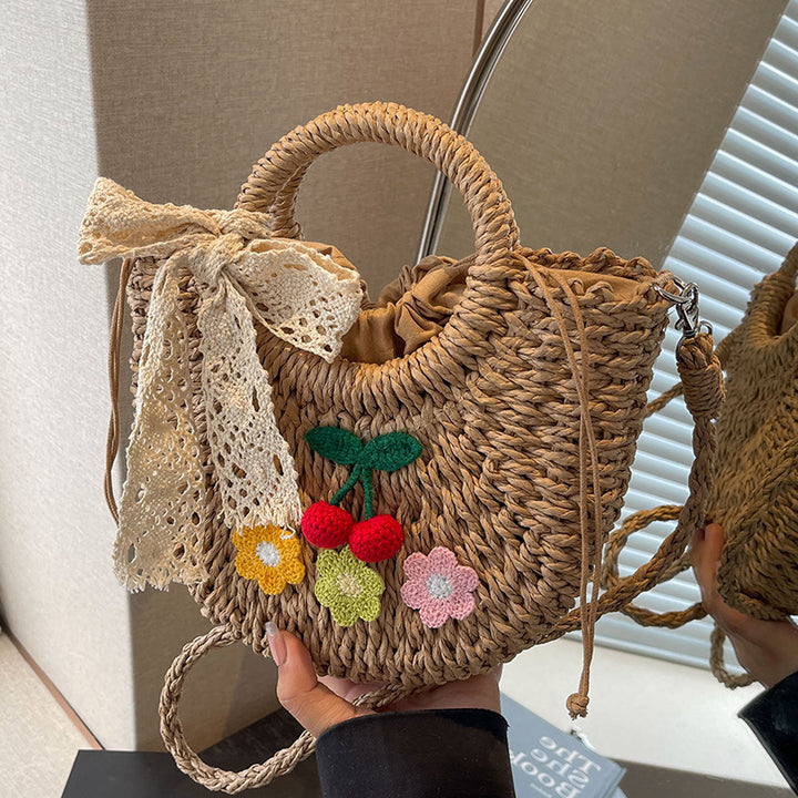 Handcrafted Floral Accent Straw Handbag