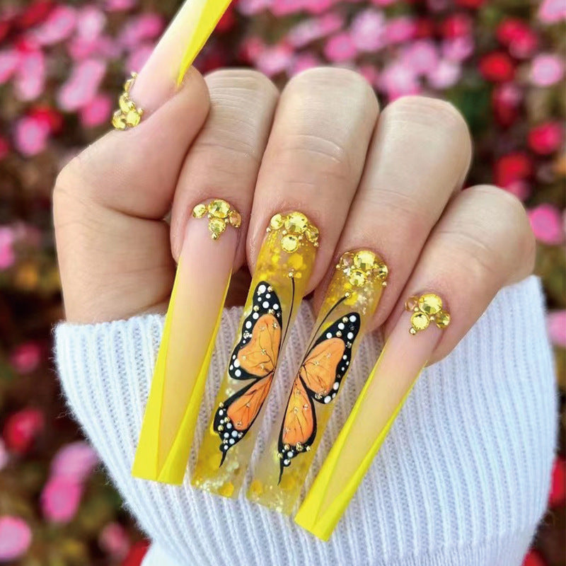 Artful Gel Nails with Butterfly Design and Glitter Kalsten