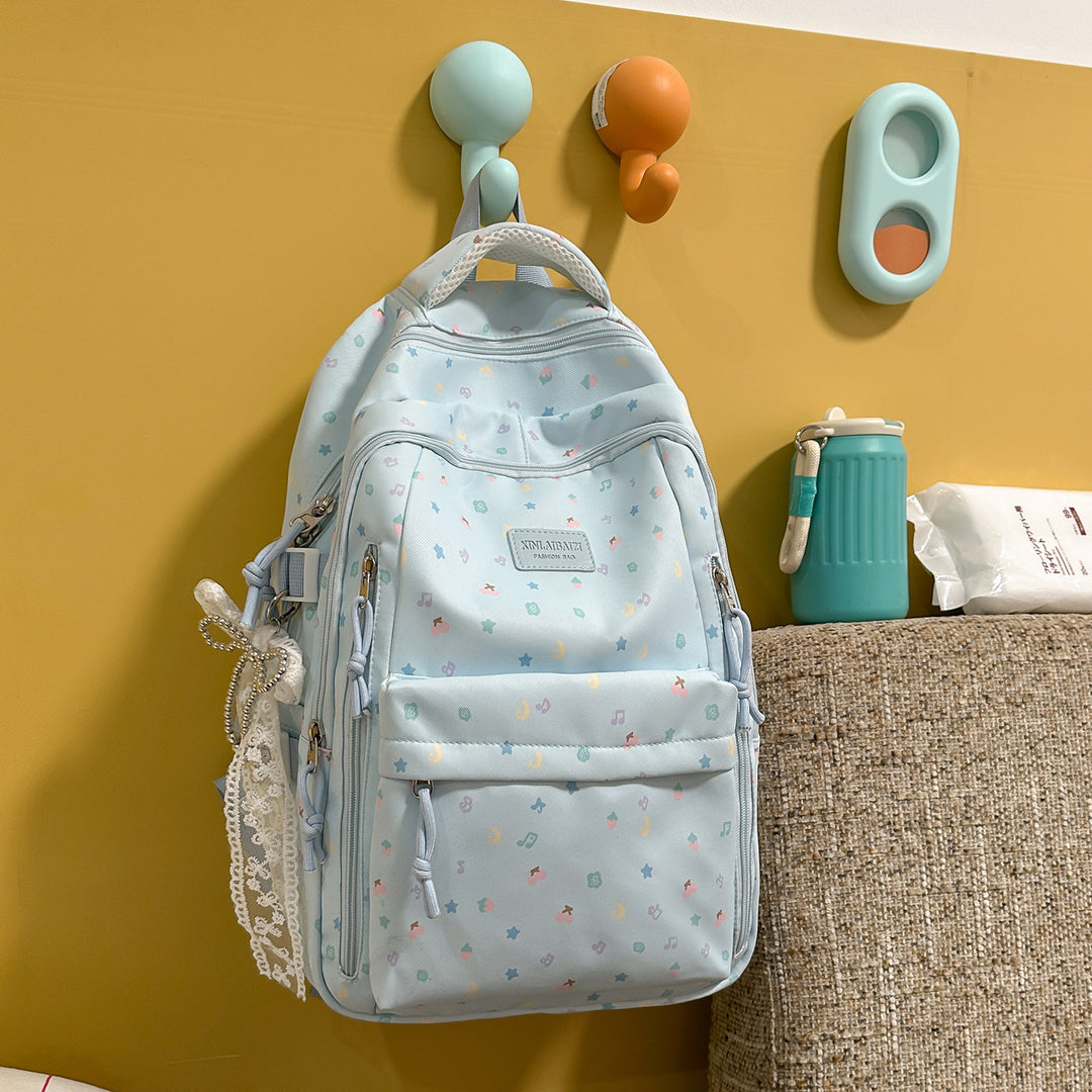 Stylish Multi-Pocket Backpack with Decorative Accents Kalsten