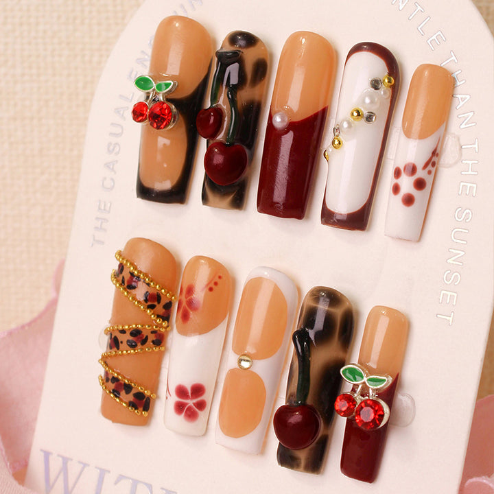 Nail art set with luxurious cherry and glitter accents Kalsten