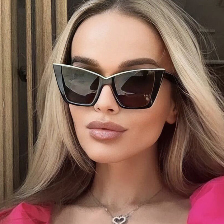 Women extravagant sunglasses with unique design and golden accents Kalsten