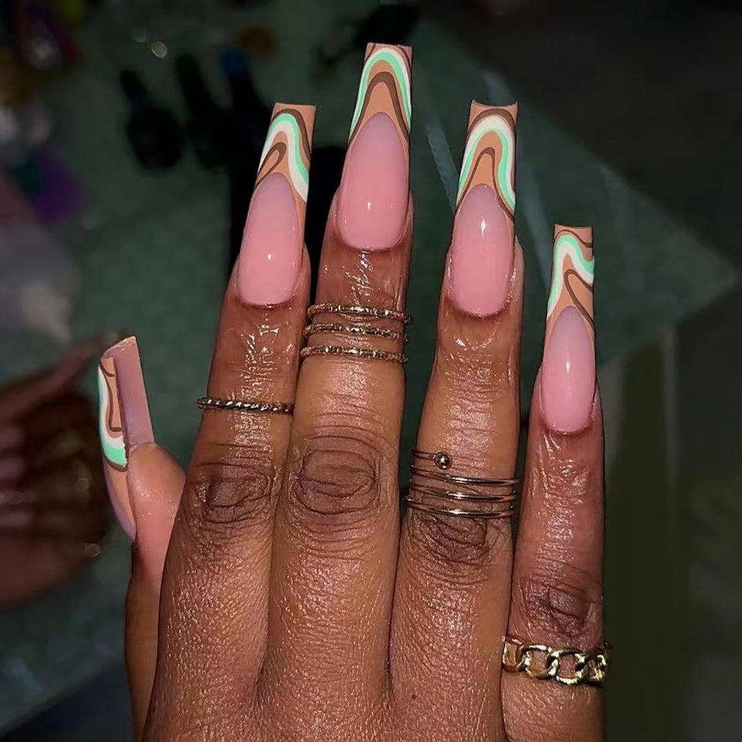 Artful acrylic nails with elegant wave design Kalsten