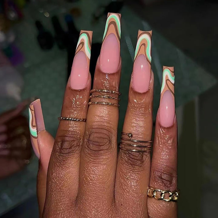 Artful acrylic nails with elegant wave design Kalsten