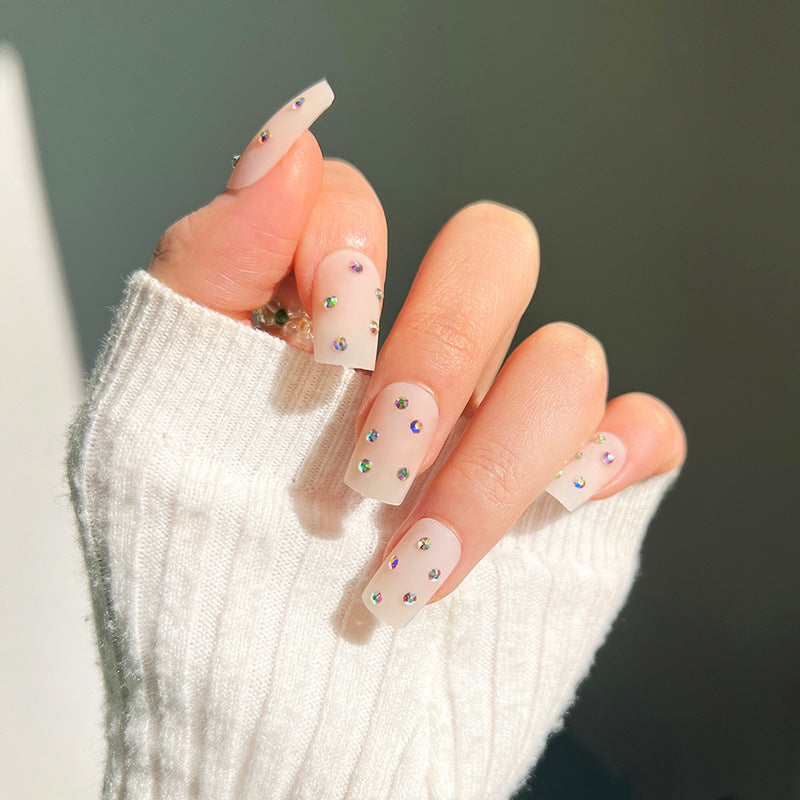 Artistic nail art with elegant rhinestone embellishments Kalsten
