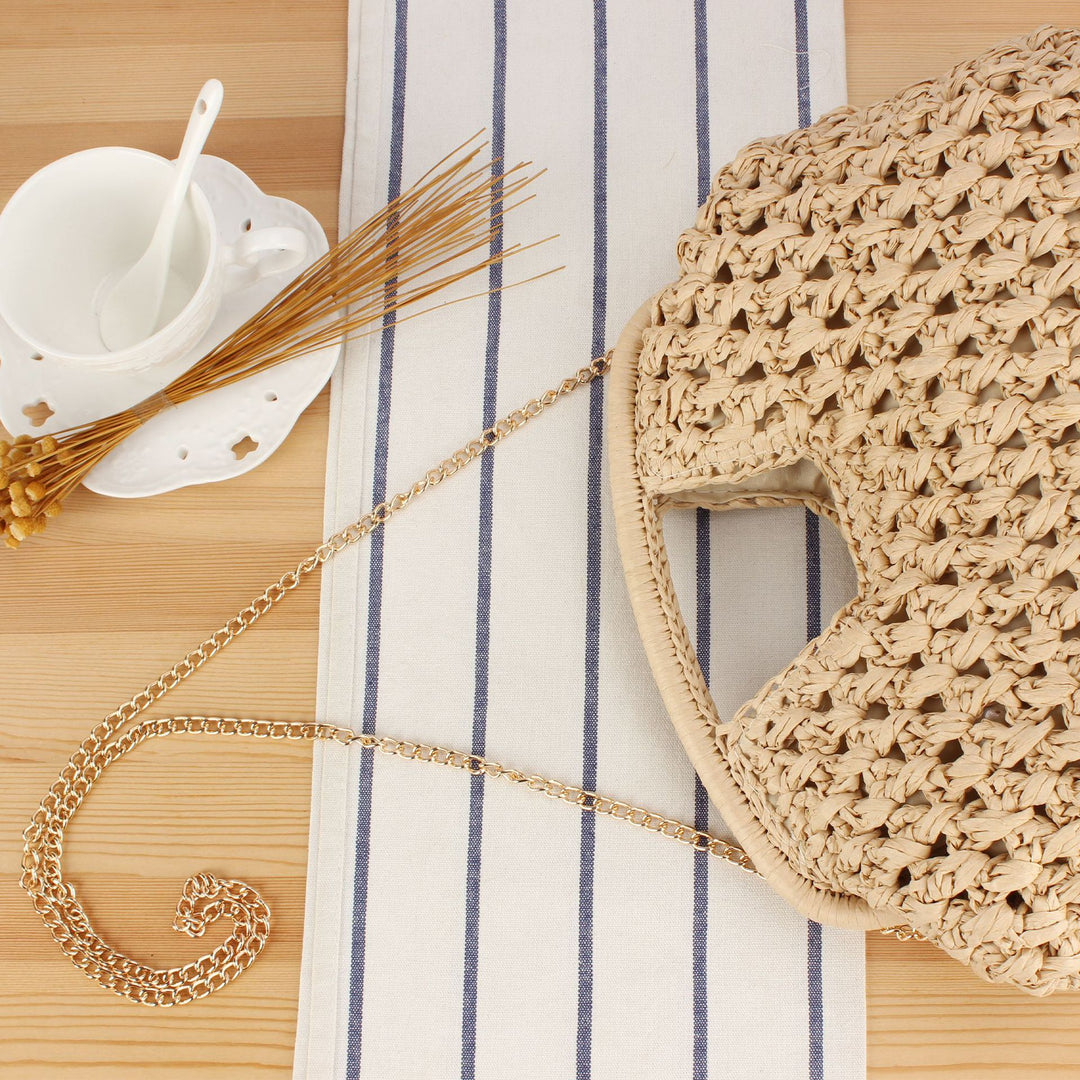 Handbag made of naturally untreated woven material with elegant chain embellishment Kalsten