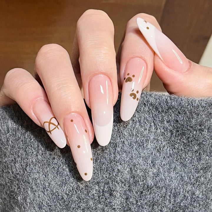 Glamorous Stiletto Press-On Nail Design with Elegant Gold Accents Kalsten