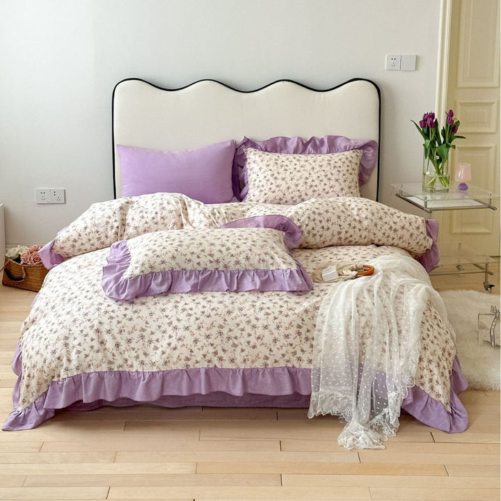 Romantic bed linen complete set made of cotton percale with delicate floral print, ruffle trim, and silky-matte finish