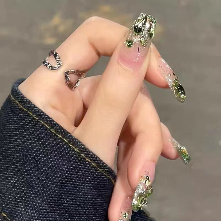 Glittering artificial nails in modern design Kalsten
