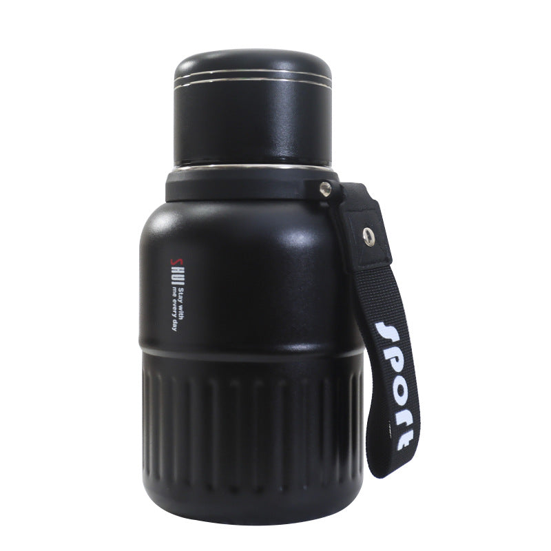 Insulated drinking bottle with integrated carrying strap Kalsten