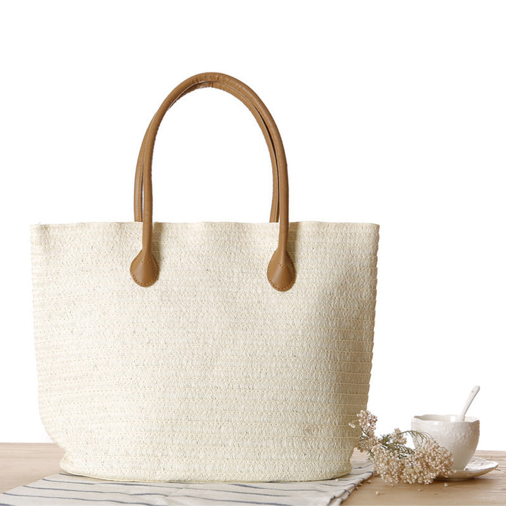 Spacious straw shopper with leather carrying handles Kalsten