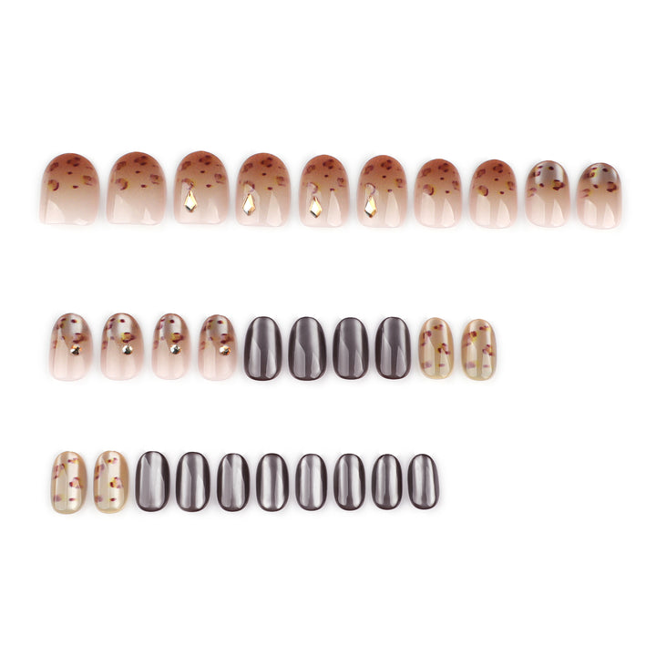 Artistic nail art with glitter accents and elegant design Kalsten
