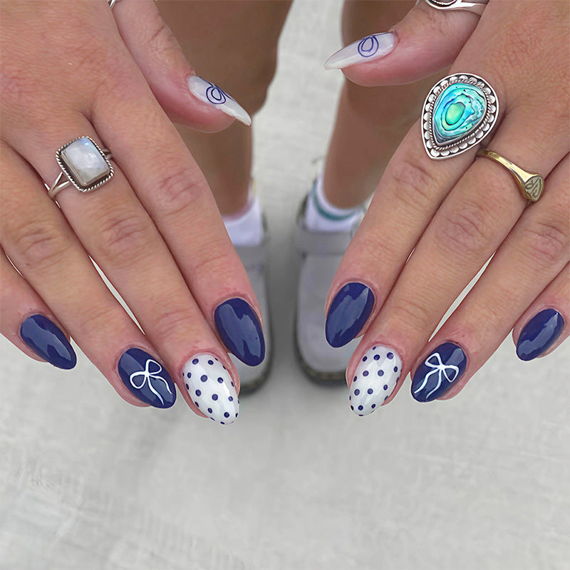 Nail set with stylish bows and dots Kalsten
