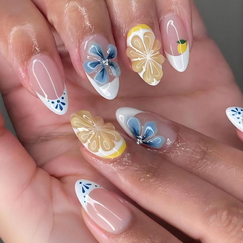 Nail art set with elegant floral and butterfly accents Kalsten