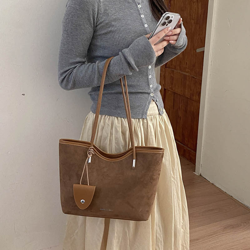 Chic Suede Tote with Decorative Pocket