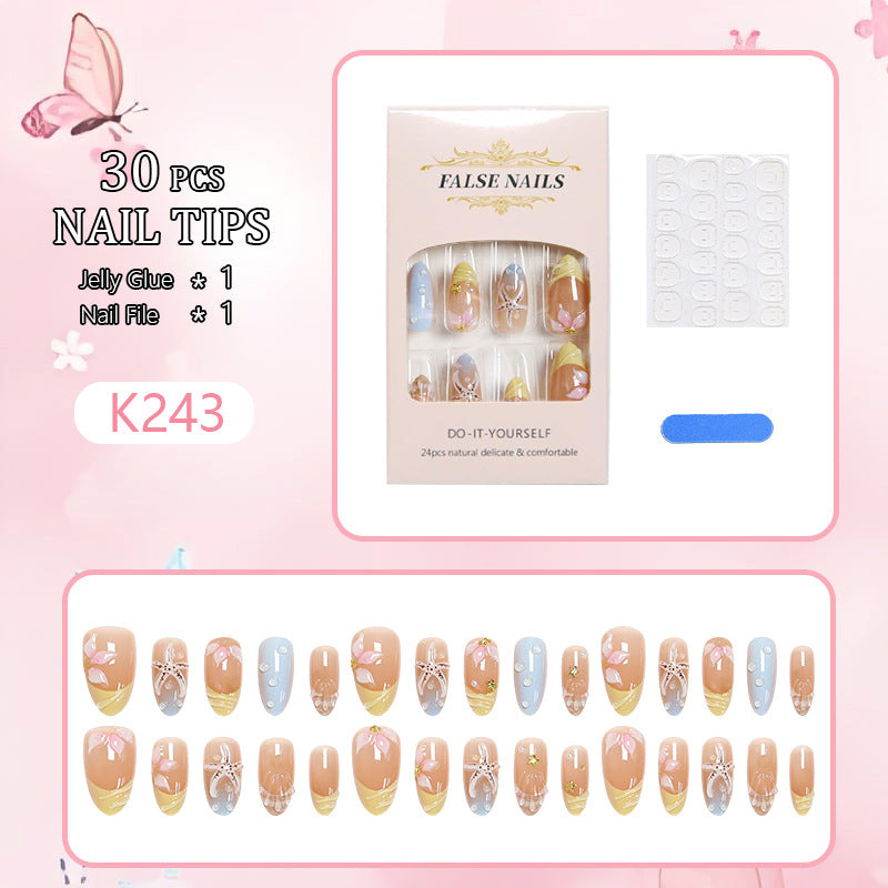 Artificial nails with floral motifs and glitter details Kalsten