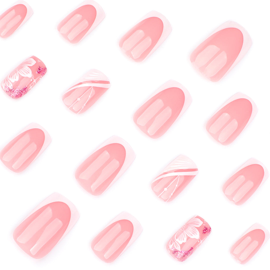 Artful Nail Art with Elegant French Tips and Floral Accents Kalsten