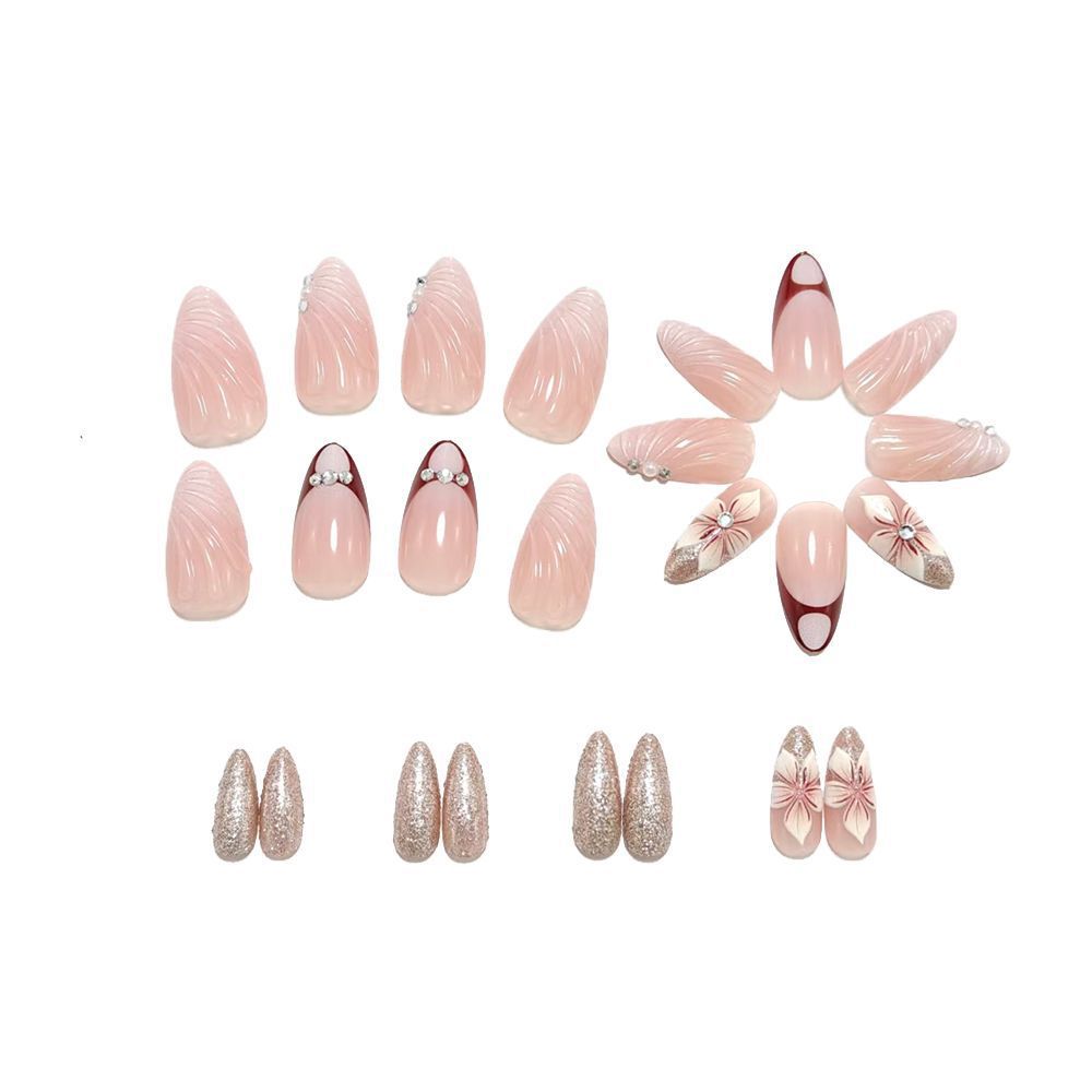 Artificial nails in elegant floral design with glitter accents Kalsten