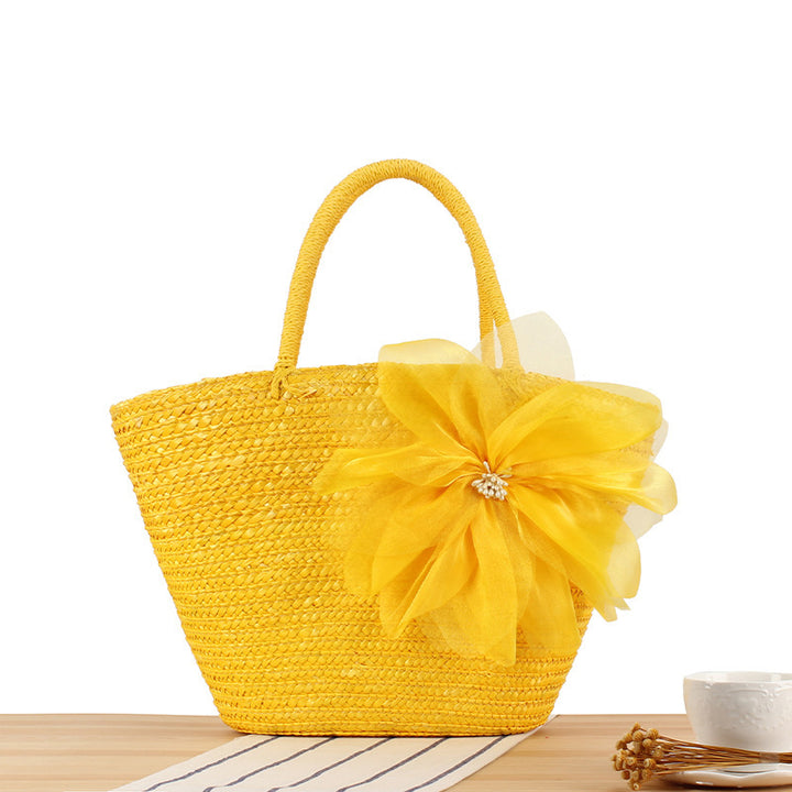 Elegant straw bag with floral accents Kalsten