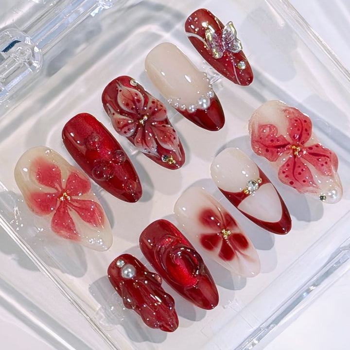 Artificial nail set with floral designs and glamorous accents Kalsten