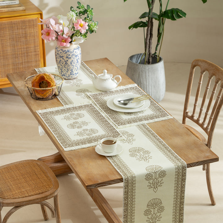 Woven runner with vintage-oriental floral pattern and fringes