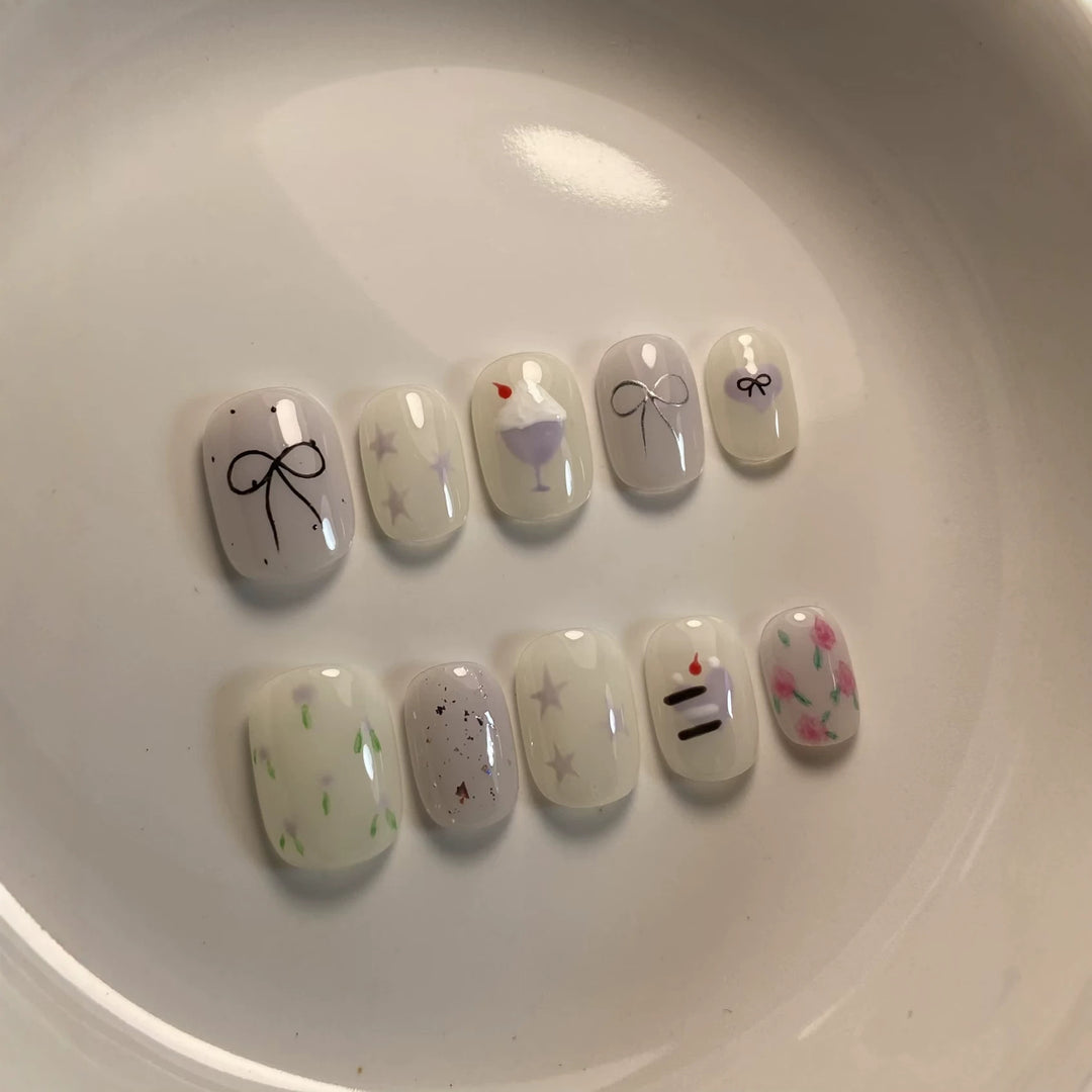 Artistic Press-On Nail Art Set with Cute Cake and Ribbon Designs