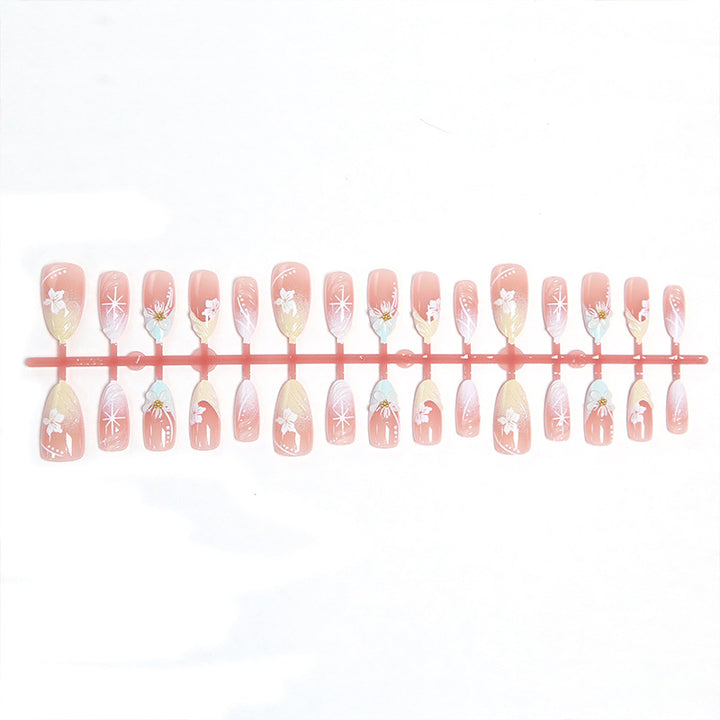 Artificial nail set with intricately detailed floral designs and shine accents Kalsten