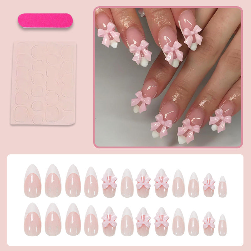 Acrylic nail set with playful bow decorations Kalsten