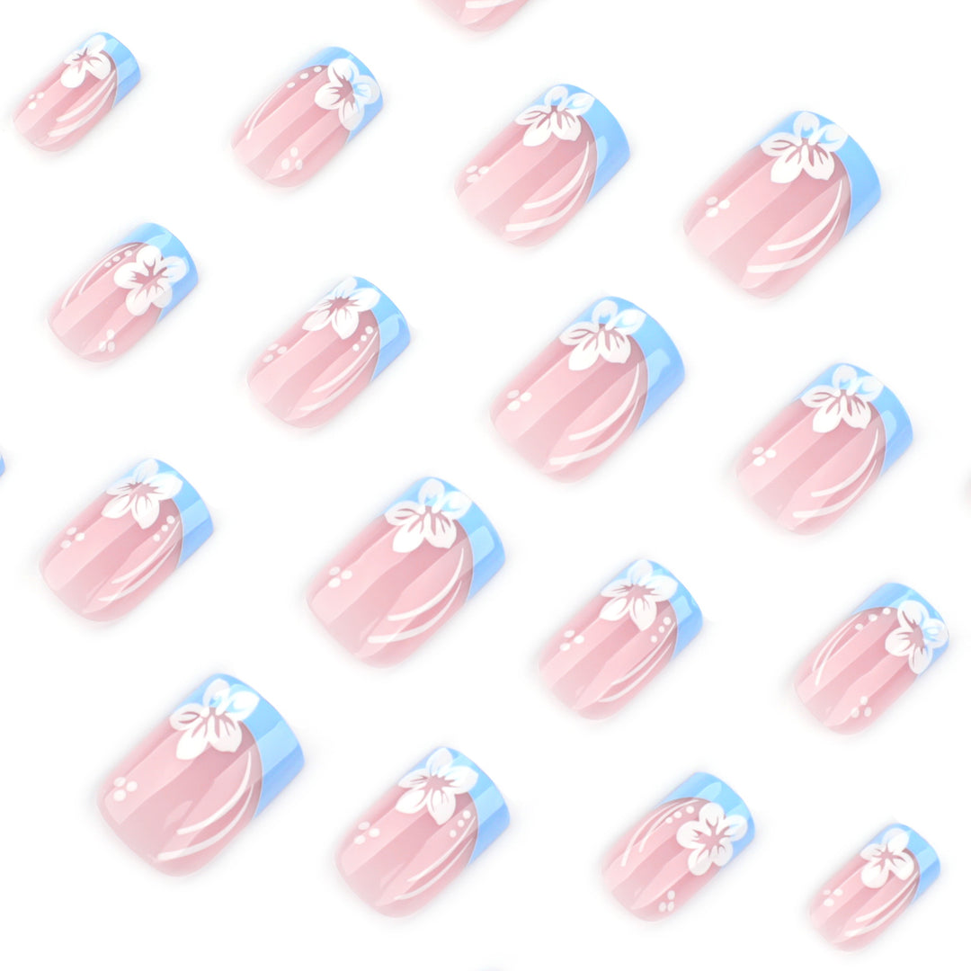 Artistic Nail Art with Floral Design and Elegant French Tip Finish Kalsten