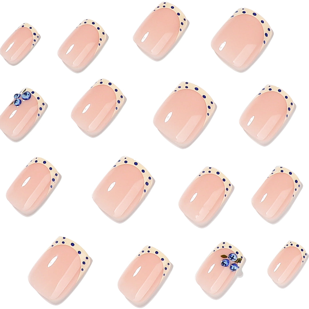 Elegantly designed nail extensions with decorative accents Kalsten