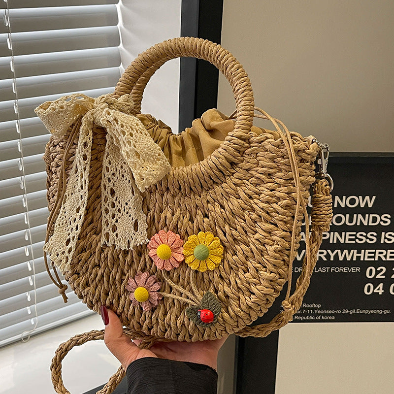 Handcrafted Floral Accent Straw Handbag