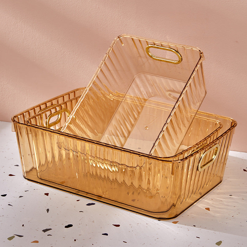 Transparent rectangular storage box with integrated carrying handles and ribbed side structure