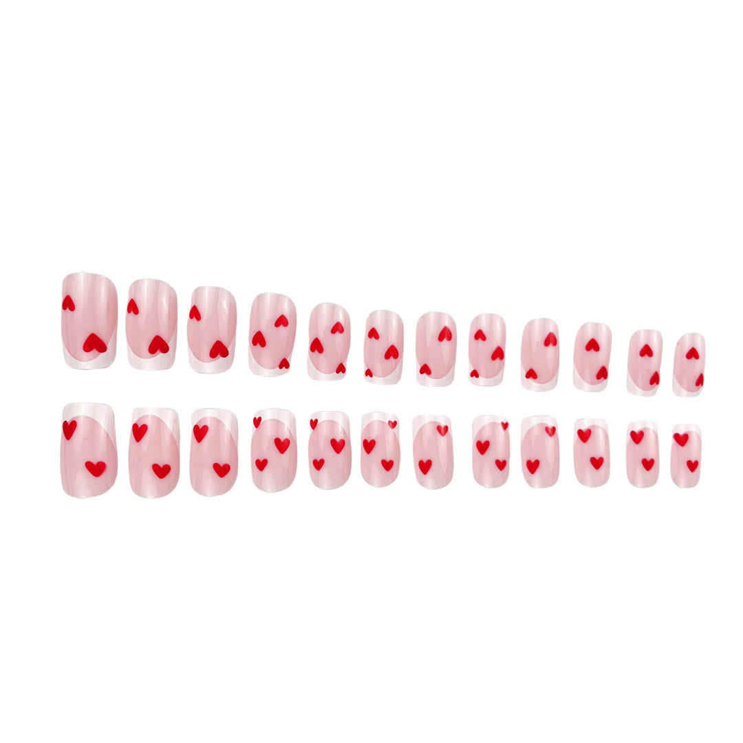 Heart-Embellished French Tip Nail Art Kalsten