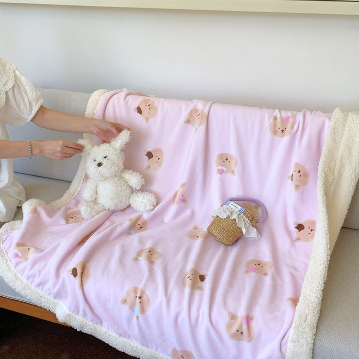 Reversible fleece blanket with cartoon cat design and teddy lining