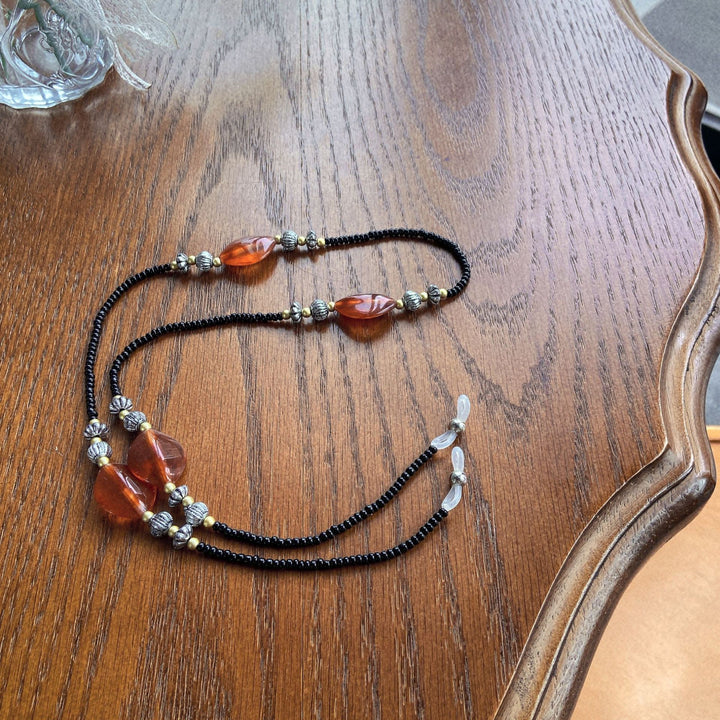 Stylish glasses holder chain with colorful accents Kalsten