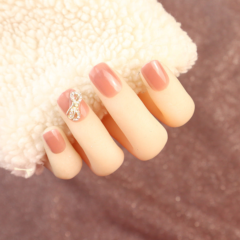 Elegant Press-On Nail Set with Rhinestone Bow
