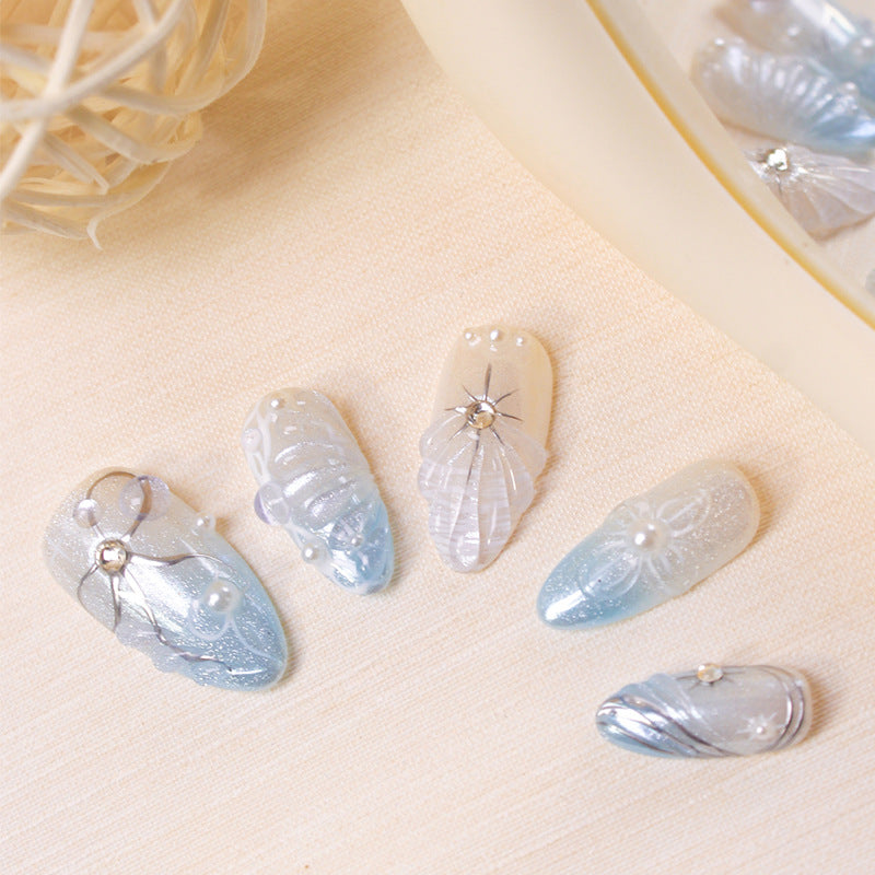 Artificial nail set with elegant shell and pearl accents Kalsten