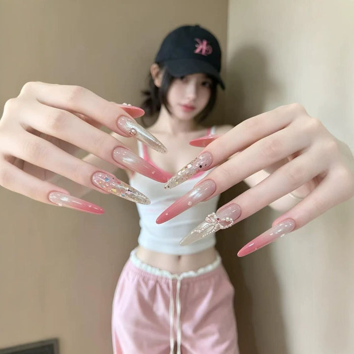 Elegant Stiletto Nail Extensions with Rhinestone Accents
