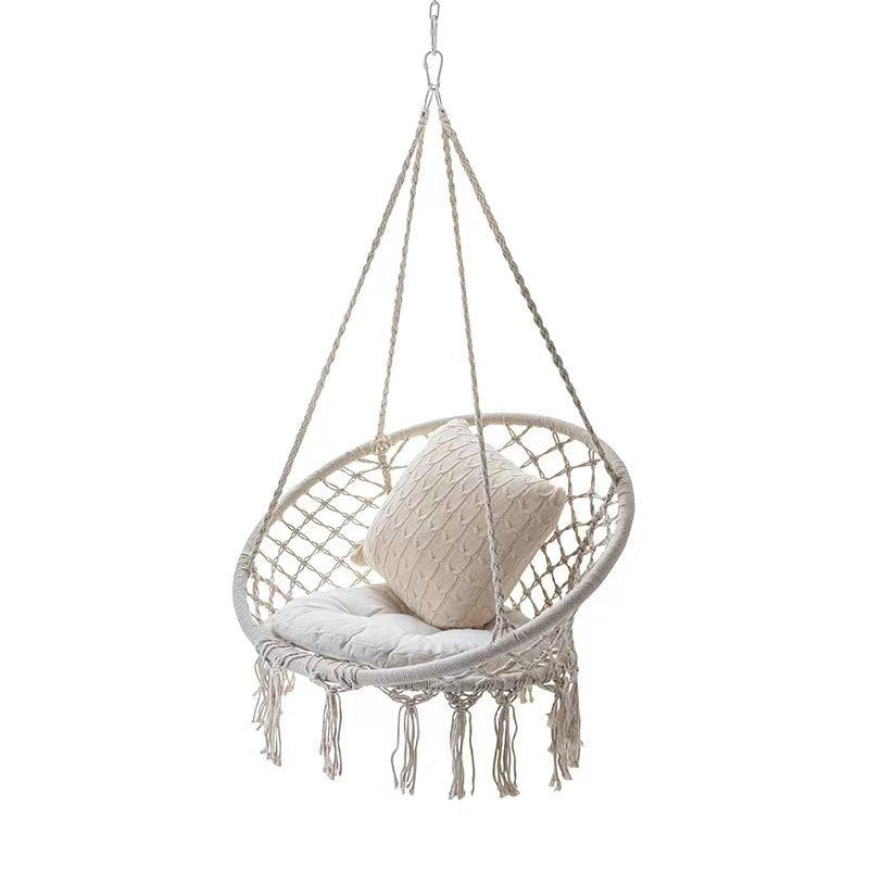 Boho macrame hanging swing chair with faux fur cushion and fringe Kalsten