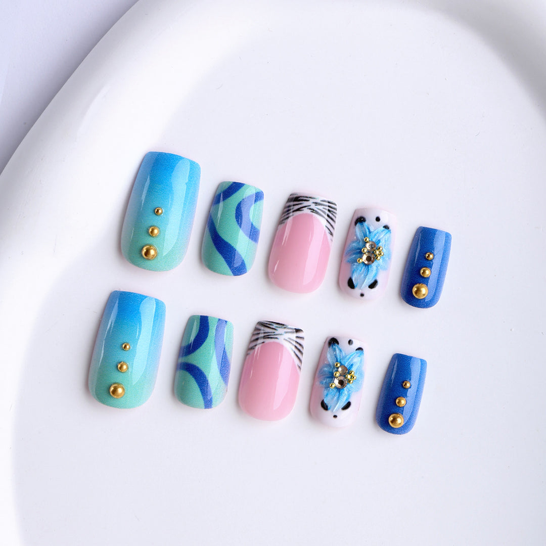 Artificial fingernails with handcrafted designs Kalsten
