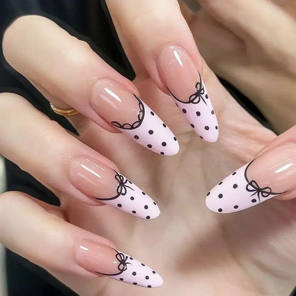 Elegant artificial nails with bow design and dots Kalsten
