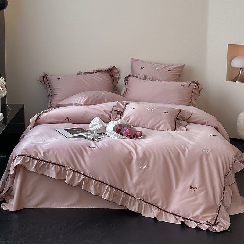 Premium bedding set made of cotton satin with ruffles and bow embroidery