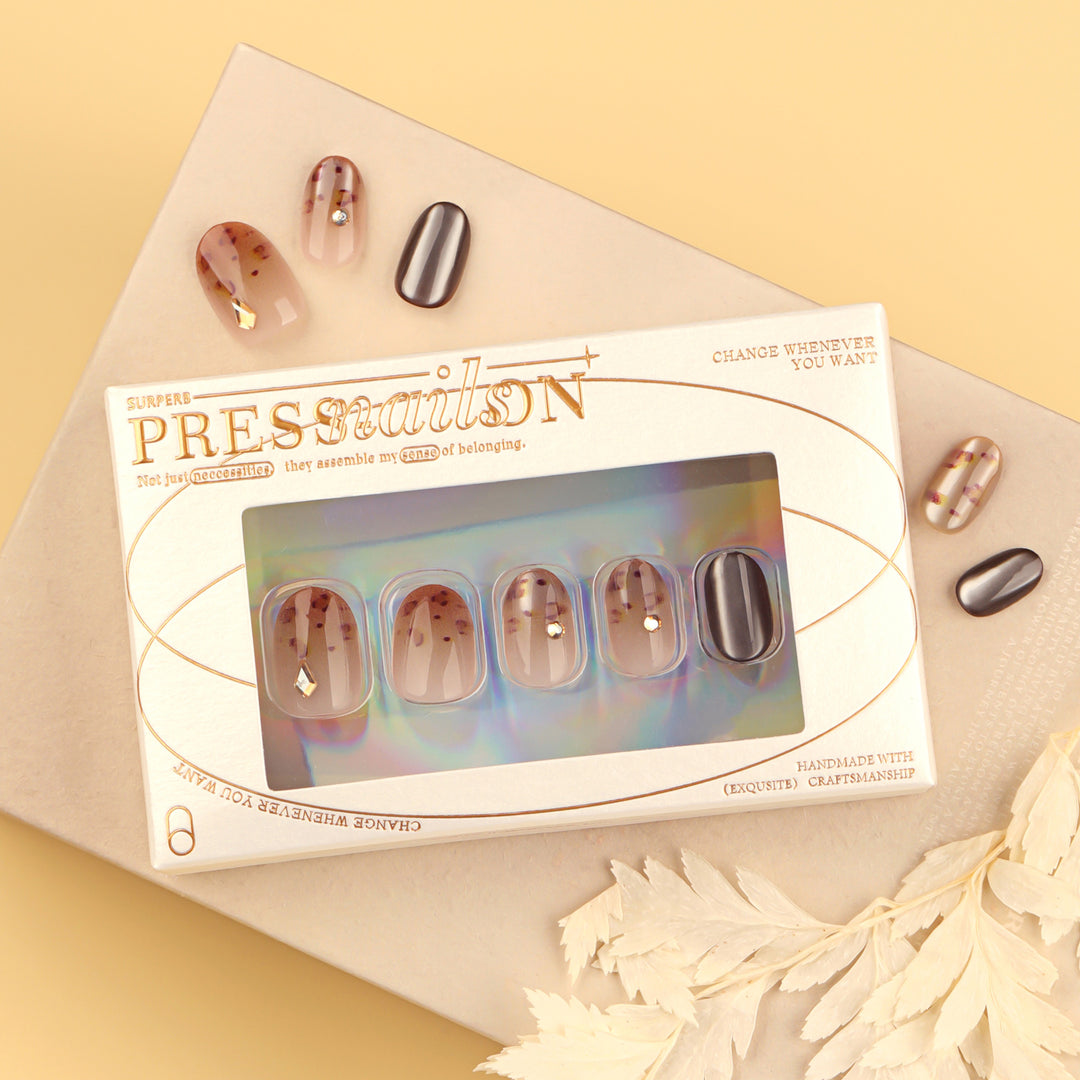 Artistic nail art with glitter accents and elegant design Kalsten